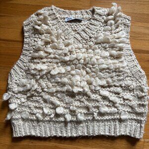 it's a FUZZY VEST❣️